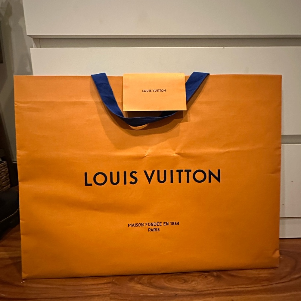 Louis Vuitton Bold Orange Bag with Blue Accents